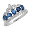 RCZ104133-BS - Sterling Silver Blue CZ Micropave Crown Ring