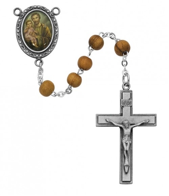 Saint Joseph rosary has olive wood beads, an image of St. Joseph for a rosary center and a pewter crucifix. Gift boxed.