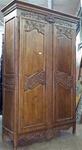 Armoire - 2 door, 4 shelf, grapevine carving, key lock