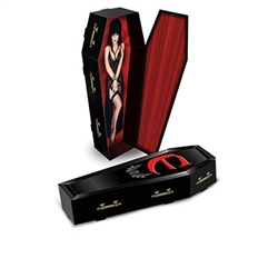 The Elvira 3-D Coffin Centerpiece is made of cardstock and printed on two sides. It measures 13 1/2 in by 5 in by 2 1/2 in. Its black with red interior and a red E and a skull with bat wings underneath. One per pack. Simple assembly required.