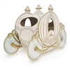 The 3-D Carriage Centerpiece is made of cardstock and printed on two sides. It's ivory with gold accents and printed with intricate details. Measures 11 inches long and 7 1/2 inches tall. Contains one (1) per pack. Assembly required.