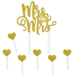 The Mr & Mrs Cake Topper is in gold glittered lettering and includes 6 gold glittered hearts. It measures 5 inches wide and 4 inches high and stands 8 1/4 inches tall. The hearts measure 1 inch and stand 3 1/4 inches tall. Seven total pieces per package.