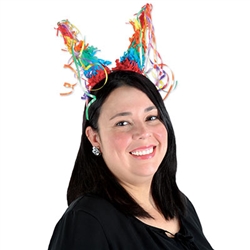 The Pinata Headband is a fun colorful accessory to take your outfit over the top! Attached to a red plastic headband are two cones covered in rainbow colored tissue with colorful ribbons on the tip of each cone. One size fits most. 1 per pack. No returns.