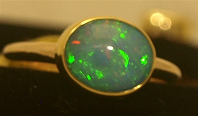 Kevin and Joanne Dowdy Oval Opal/Gold Ring