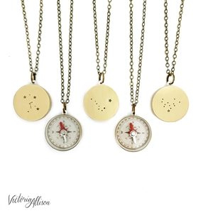 Small brass compass featuring a hand stamped constellation on the back side. Choose from zodiac constellations or other popular constellations. Hangs from an antiqued brass chain.
