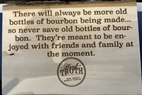 Old Bottles of Bourbon Etched Wood Sign