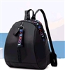 Black backpack purse with colorful LOVE detail