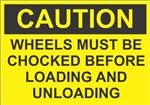 Caution Sign - Wheels Must Be Chocked Before Loading