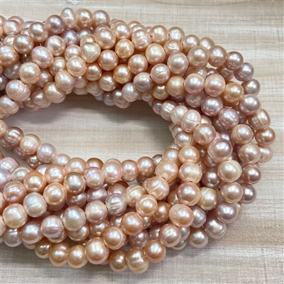 kelliesbeadboutique.com | 10mm Large Hole Peach Pink Freshwater Pearls