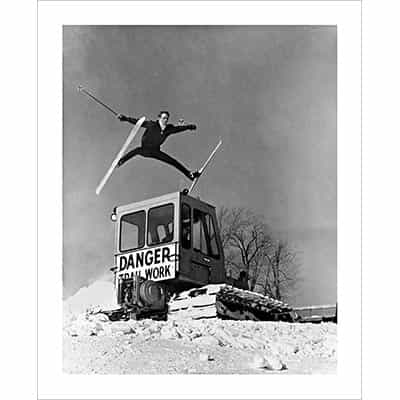 Vintage photo of Ski Patrol Jumping over a Snowcat (Black & White or Sepia, 2 Sizes: 8 x 10 and 11 x 14 inches)