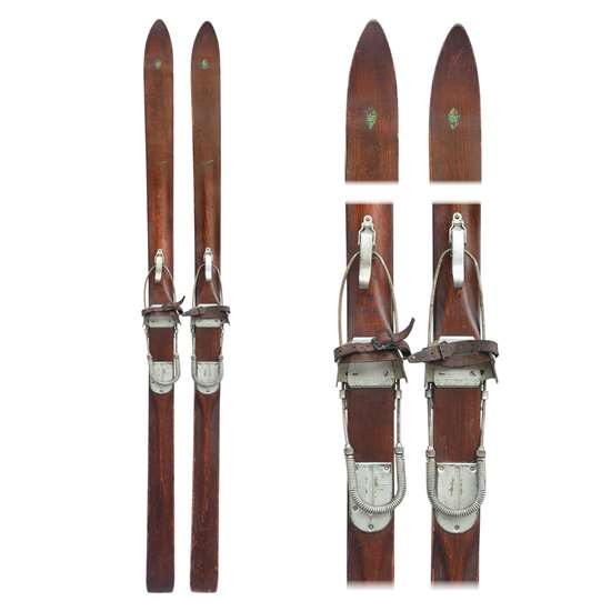 The ski tips have a dark shadow that are not on the actual skis. The shine on the tails are reflection and also not on the skis. 1940s J.C. Higgins Ridge Top Vintage Downhill Skis with Bear Trap and Cable Bindings