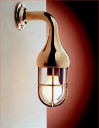 Brass wall light wih protective gille