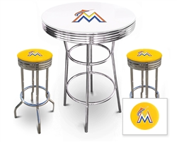 Bar Table Set 3 Piece with a White and Chrome Table Featuring the Miami Marlins MLB Team Logo Decal with a Glass Top and 2-29" Tall Swivel Seat Stools with the Team Logo on Yellow Vinyl Covered Seat Cushions