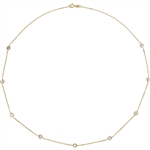Diamond Essence Nine Station Necklace With Round Brilliant Bezel-set Stones,
2.25 Cts.T.W. in 14K Solid Yellow Gold.