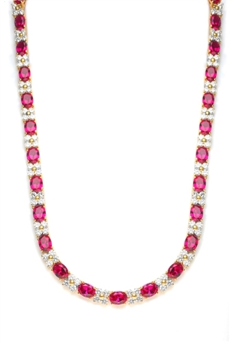 Diamond Essence Designer Necklace with 1.25 Cts. Oval cut Ruby Essence and Round Brilliant Diamond Essence Stones. Appx. 72.0 Cts. T.W. set in 14K Solid Yellow Gold.