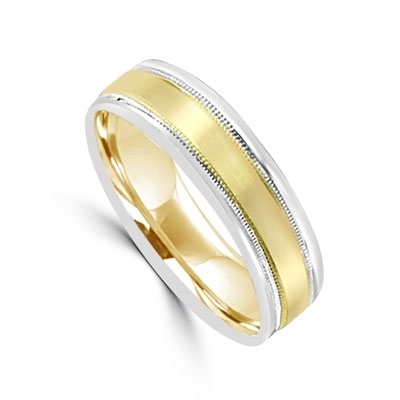 Smart 14K two-tone wide Gold Band with Yellow Gold in the center and White Gold on each side. Beautiful intricate filigree on the outside edges for even more beautiful music.