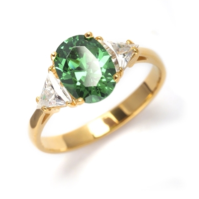 Stunning Ring, 2 Cts. T.W, with 1 Ct Oval Cut Emerald Center  and White Trilliant Diamond Essence Stones on side, in 14K Solid Yellow Gold.