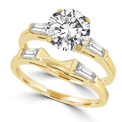 Ring – round stones and baguettes with 'c' curve ring