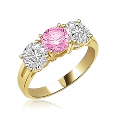 Three-Stone-Ring--Precious pink Diamond Essence diamond, 2.0 Cts. with Diamond Essence side stones, 4.0 Cts. T.W. set in 14K Solid Yellow Gold.