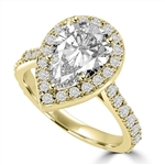 Diamond Essence Halo Setting Designer Ring With 3 Cts. Pear Center and Melee around And On The Band, 5.50 Cts.T.W. In 14K Solid Yellow Gold.
