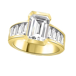 Escape with this Wide Band Ring with Channel Set Emerald Essence, 2.5 cts., separated by straight Diamond Bright Baguettes set vertically for a totally magnificent effect. 3.5 cts. T.W. set in 14K Solid Yellow Gold.