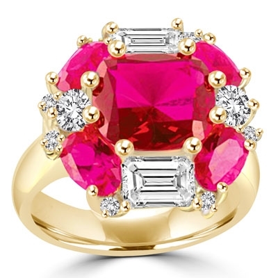 Ring – emerald cut and oval cut ruby stones with baguettes