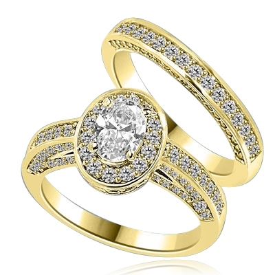 Wedding Set--1.0 ct. Oval cut Diamond Essence set in the center with melee around. Matching band with Melee. 2.50 cts.t.w.in 14K Solid Yellow Gold.