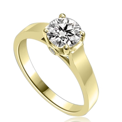 Diamond Essence Solitaire Ring Artistically set in wide band with a beautiful accent  on both sides to enhance the looks set in 14K Solid Yellow Gold.