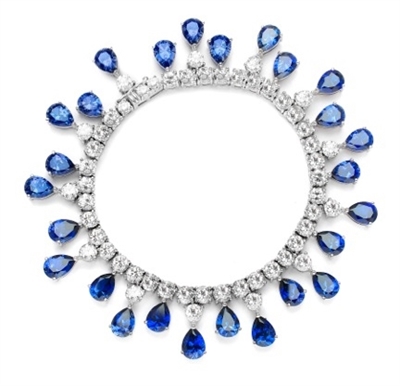 Diamond Essence dazzling Bracelet, 7.25" long. 1.0 Ct. each Sapphire Essence Stone dangling from Round Brilliant Diamond Essence stone. Appx. 50.0 Cts. T.W. set in Platinum Plated Sterling Silver.