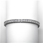 Platinum Plated Sterling Silver tennis bracelet strung with 43 princess cut masterpieces in a mesmerizing array, with double safety clasp, 12.0 cts. T.W.