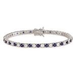 Diamond Essence Sapphire-and-Diamond Tennis Bracelet--7" tennis bracelet alternates round-cut Sapphire Essence and Diamond Essence jewels.5.0 Cts. T.W. set in Platinum Plated Sterling Silver.