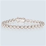 7 Inches Bracelet with delirious bezel set round Diamond Essence Masterpieces forming 5.60 Cts. T.W.