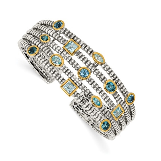 Wide cuff bracelet with diamond essence sky blue and london topaz stones in bezel setting