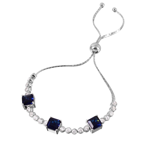 Diamond Essence Adjustable Bracelet with 1.0 ct. each Sapphire Princess cut stone in prong setting and 0.20 ct. each Round Brilliant stone in bezel setting. Beautiful bracelet  to fit on any size wrist. 8.0 Cts.T.W. in Platinum Plated Sterling Silver.