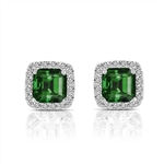 Designer Stud Earrings. One carat emerald Essence Asscher cut stone in four prongs setting and surrounded by Diamond Essence melee. 3.0 cts.t.w. in Platinum Plated Sterling Silver.