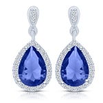Beautiful drop earring, showing off  2.0 carat Sapphire Essence Pear cut stone, each surrounded by Diamond Essence melee. 4.20 cts.t.w. set in Platinum Plated Sterling Silver.