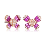 Diamond Essence Butterfly Stud Earrings With Ruby Baguettes and Round Melee, 2.10 Cts.t.w. set in Rose Plated Sterling Silver.
10mm Length  x 13mm Width.