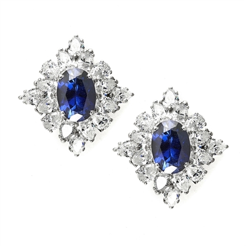 Prong Set Earrings with Simulated Oval Cut Sapphire Center and Pear Cut Diamonds by Diamond Essence set in Sterling Silver