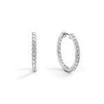Platinum Plated Sterling Silver hoop earrings with a melee of Round cut Diamond Essence stones orbiting all around your delicate lobes. These highly flattering hoops are also hinged half way around so they can go on and come off in a flash. 2.0 cts.t.w.