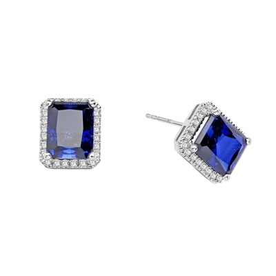 Sapphire Earrings - 4.0 Cts. Emerald cut Sapphire Essence set in center with sparkling Melee around. 8.5 Cts. T.W. set in Platinum Plated Sterling Silver.