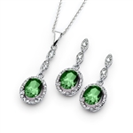 A marvelous pair of the four-prong set designer earring-pendant duo for women with oval-cut Emerald Diamond by Diamond Essence set in platinum-plated sterling silver. 5.0 Cts.t.w.
