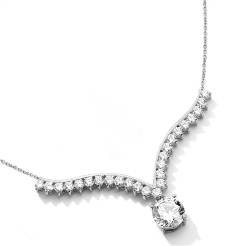 Supreme Necklace that is sure shot eye candy! 2.0 Cts. Brilliant White Diamond Essence Round Dangler atones a curvy melee of Round Brilliants set exquisitely in an Art Deco Setting! 3.50 Cts.T.W. attached with Chain in 14k Solid White Gold.