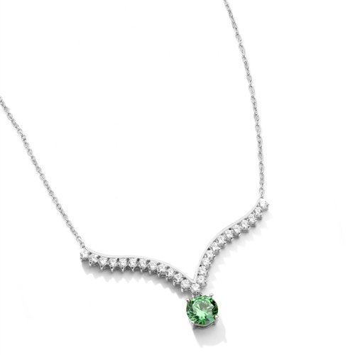 Supreme Necklace that is sure shot eye candy! 2.0 Cts. Round Emerald Essence Dangler atones a curvy melee of Round Brilliants set exquisitely in an Art Deco Setting! 3.50 Cts.T.W. attached with Chain in Platinum Plated Sterling Silver.