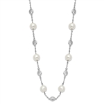 A stunning bezel-set necklace for women with 12 simulated pearls and 11 artificial round brilliant Diamonds  by Diamond Essence set in platinum plated sterling silver. 2.75 Cts.t.w. 7.86 mm width