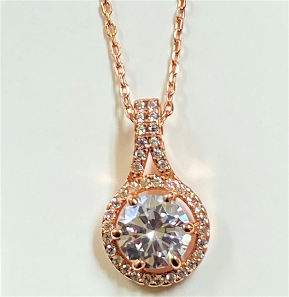 Diamond Essence Designer Pendant with Round Brilliant Stone and Melee, 2.20 Cts.t.w. set in rose Plated Sterling Silver. 18mm Length x 10mm Width.