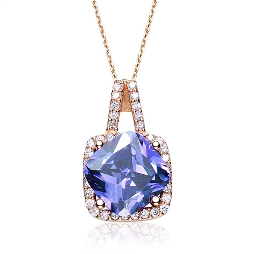 Diamond Essence Pendant with 5 Cts. Cushion cut Sapphire in Four Prongs surrounded by Brilliant Melee in Platinum Plated Over Sterling Silver.
Approx Size Of Pendant Is 20 mm Length And 12 mm Width.