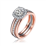 Diamond Essence Designer Ring in two tone. Center band with the Round Brilliant 1carat,surrounded by Diamond Essence melee.1.25 Cts. T.W. in Platinum Plated Sterling Silver & Rose gold plated over Sterling Silver. Ring with a detachable ring guard.