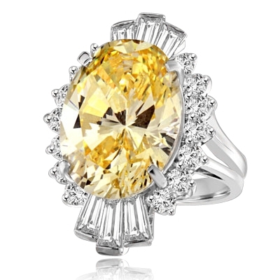 Diamond Essence Designer ring in Platinum Plated Sterling Silver with 10 cts. Oval Canary center. Round Essence and Baguettes on either side, set in prong settings, makes it a classic cocktail ring. 13.0 cts.t.w.