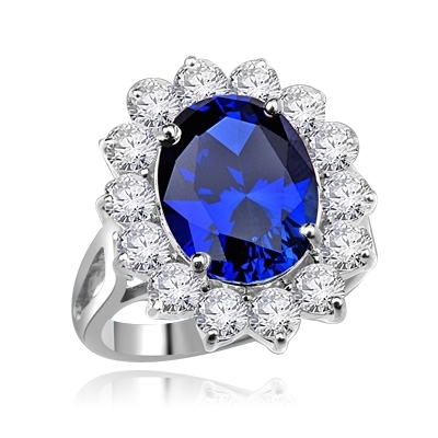 Platinum Plated Sterling Silver Princess ring with 5.0 cts Oval Sapphire Essence center and 14 round brilliant Diamond Essence stones 6.50 cts. T.W.