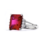 Superb Ring with 5 Cts Emerald Cut Ruby Essence Center Stone and melee accents for a total of 5.2 Cts.t.w. in  Platinum Plated Sterling Silver.